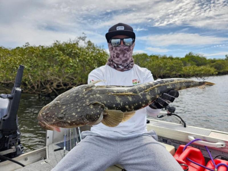 Dan with a solid island flathead - photo © Fisho's Tackle World