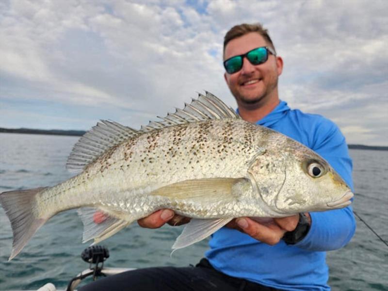 Staff member Jackson is a bit of a light tackle specialist when it comes to finesse soft plastic fishing, targeting species like this grunter - photo © Fisho's Tackle World