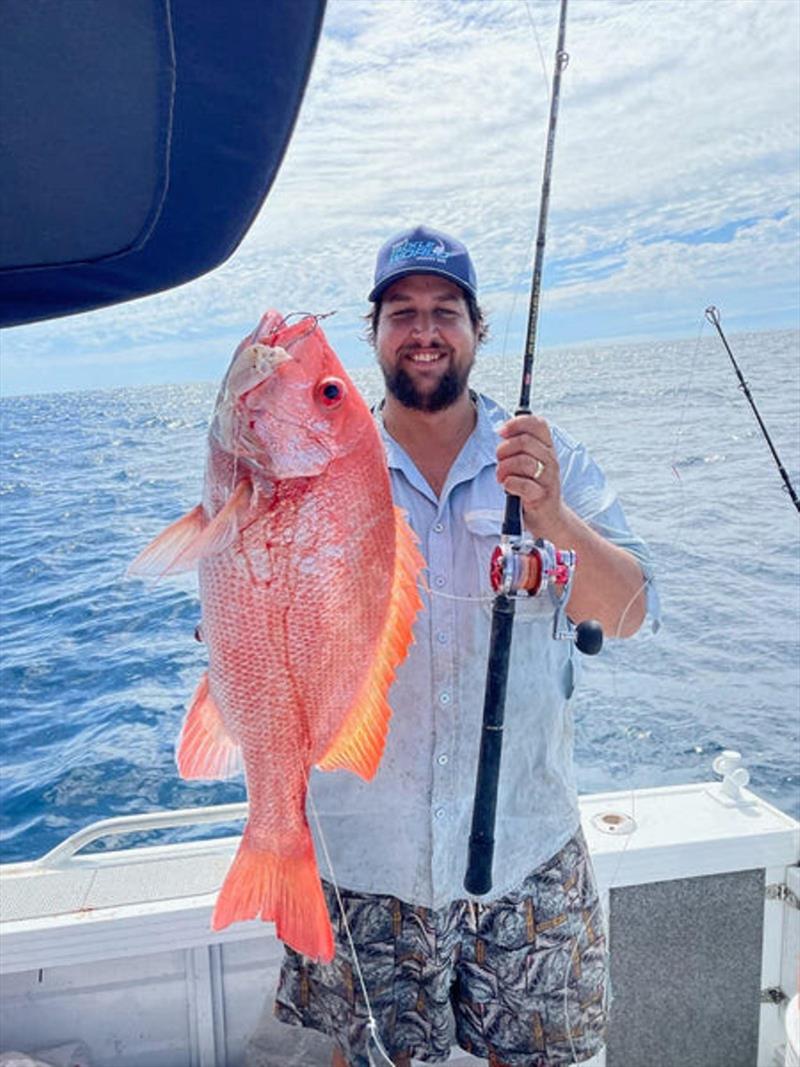 Matty with a solid nannygai from a recent reef fishing mission - photo © Fisho's Tackle World