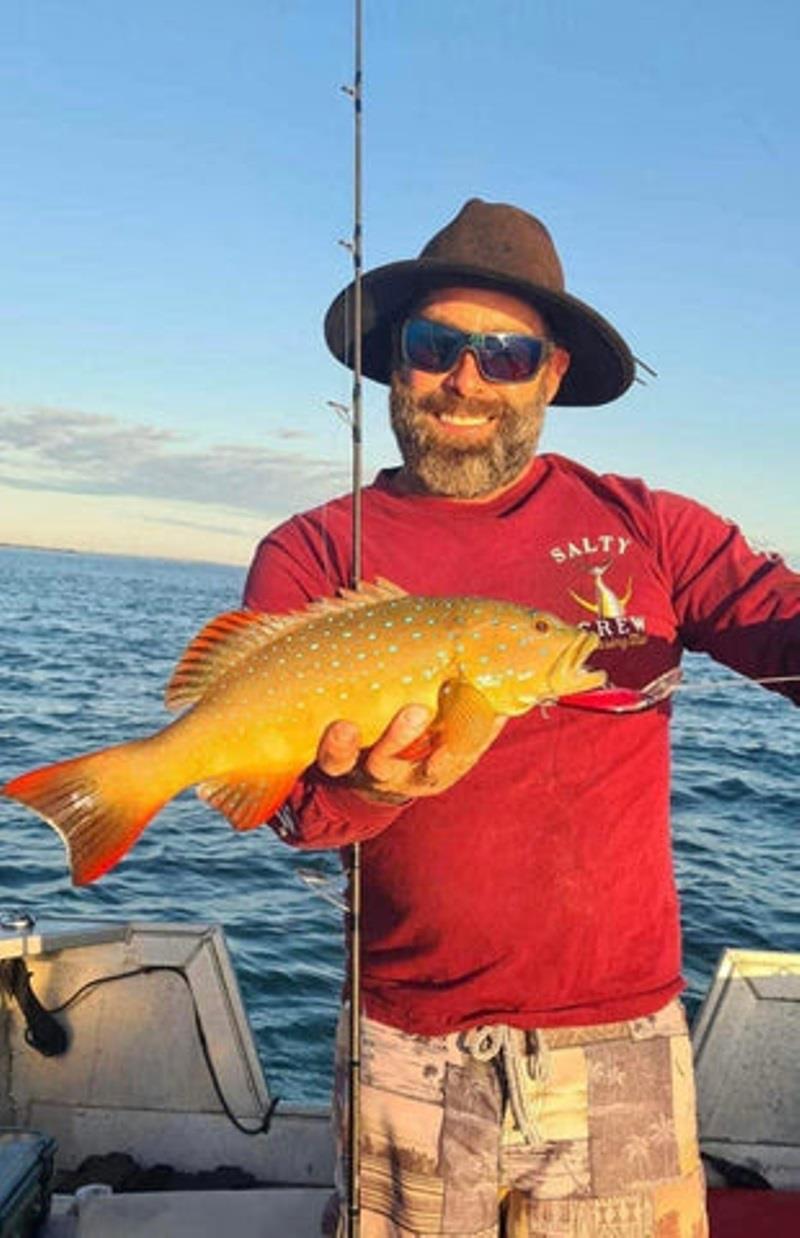 The inshore trout bandit Luke trolling up another nice specimen - photo © Fisho's Tackle World