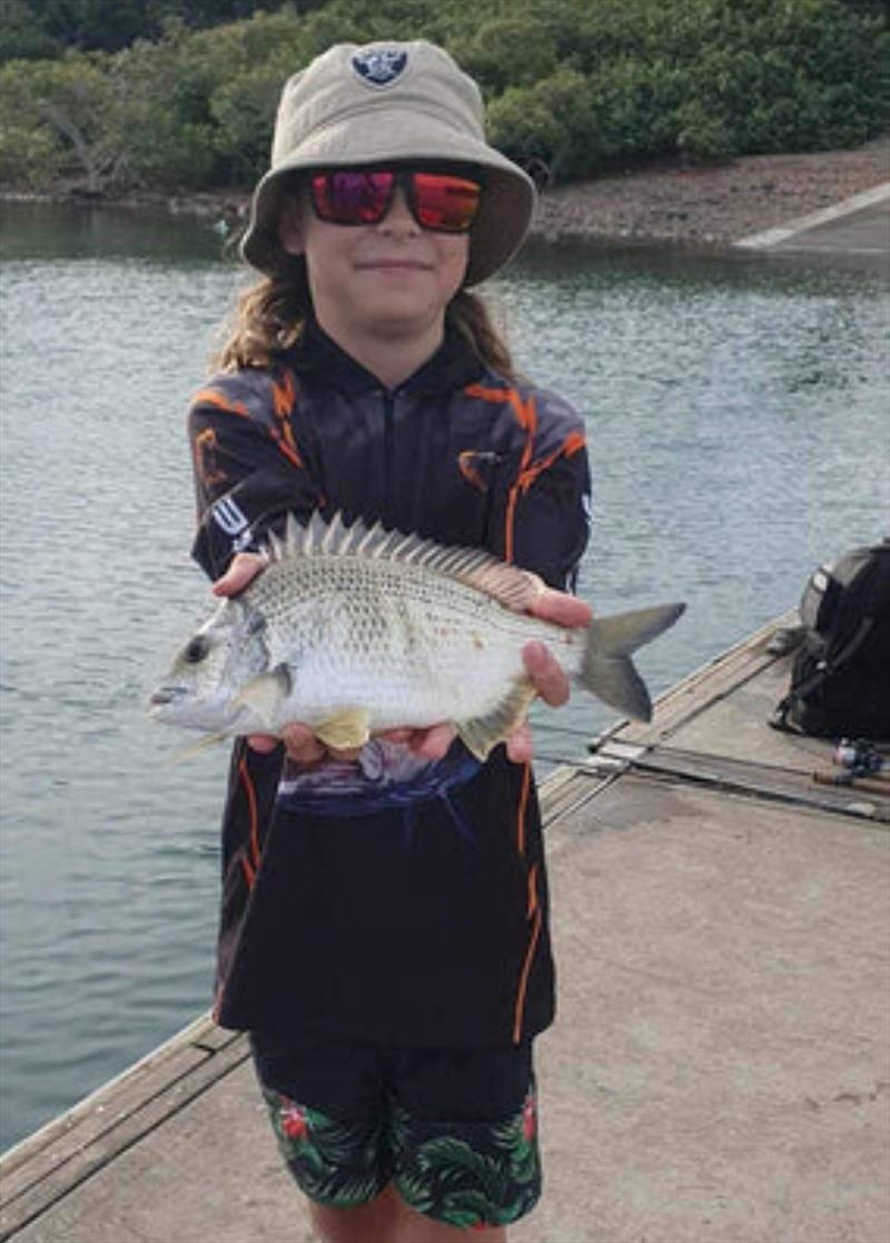 Issaac is proud of this ripper bream from the River Heads pontoon. That's a beauty mate photo copyright Fisho's Tackle World taken at  and featuring the Fishing boat class