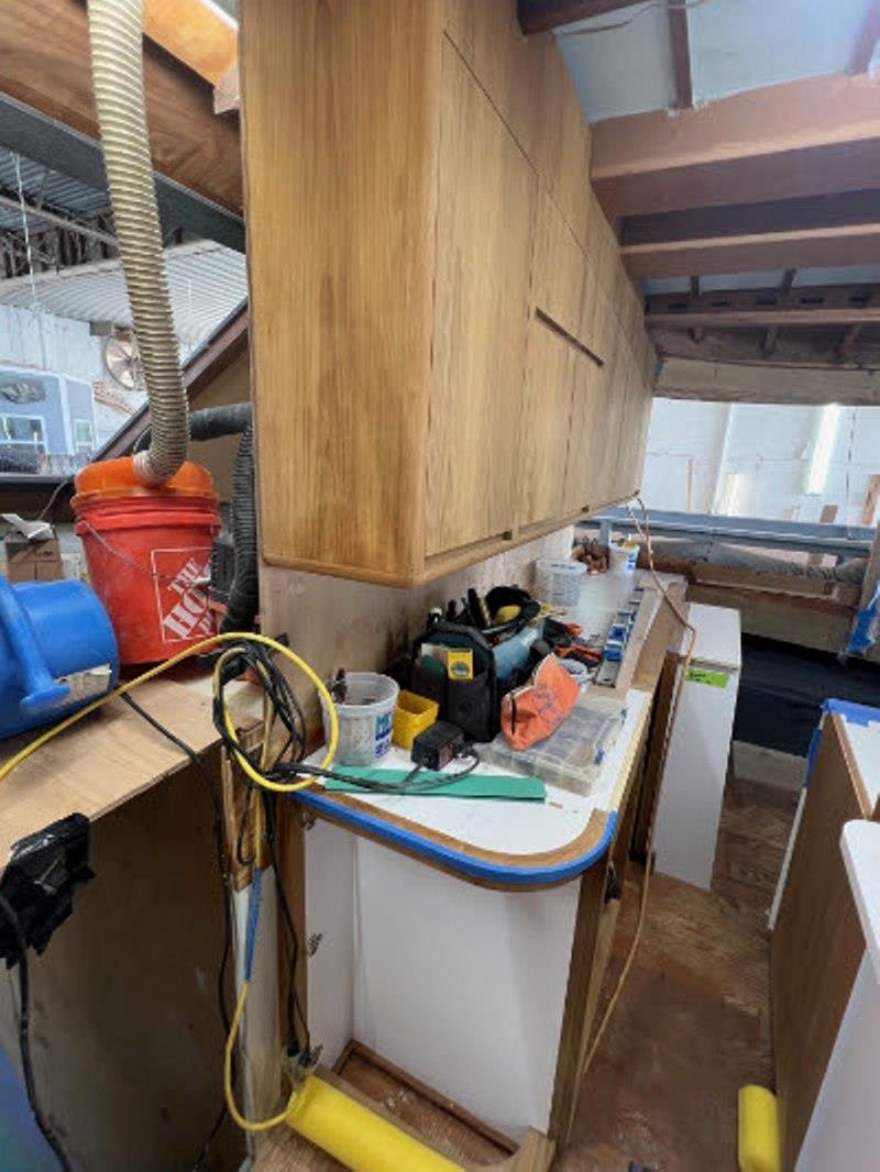 Hull #9 - Upper and lower galley cabinets installed - photo © Michael Rybovich & Sons