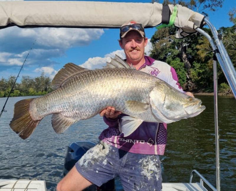 Luke Waters proudly displays a beaut salty from a local river. Focus on them this month while the crowds head to the dams - photo © Fisho's Tackle World