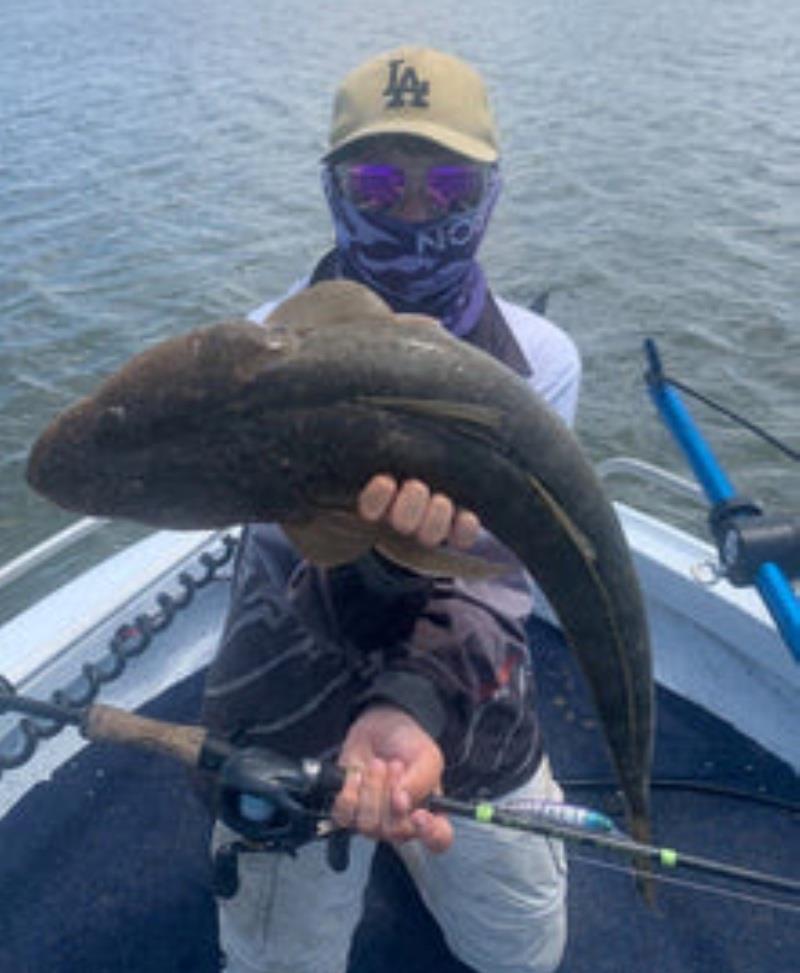 This is Noah again behind the mask with a sample of the sort of flathead you can catch this time of year - photo © Fisho's Tackle World