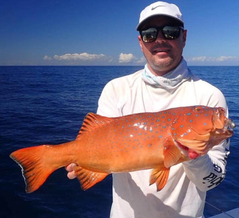 Tri from Fraser Guided Fishing puts his clients onto some fine coral trout. They become a more viable target now - photo © Fisho's Tackle World