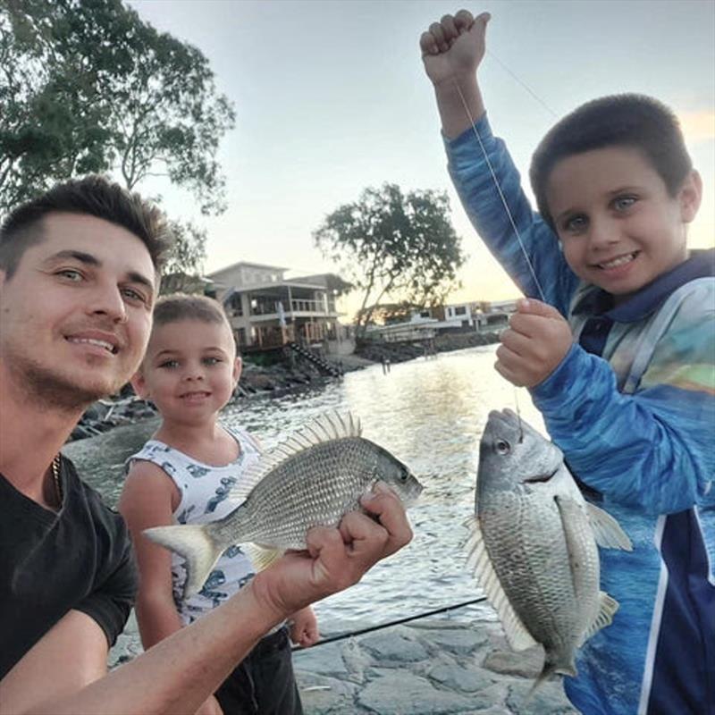 The Ridgeway boys having fun with the local bream population. Happy kids and a very proud dad make for lifetime memories - photo © Fisho's Tackle World
