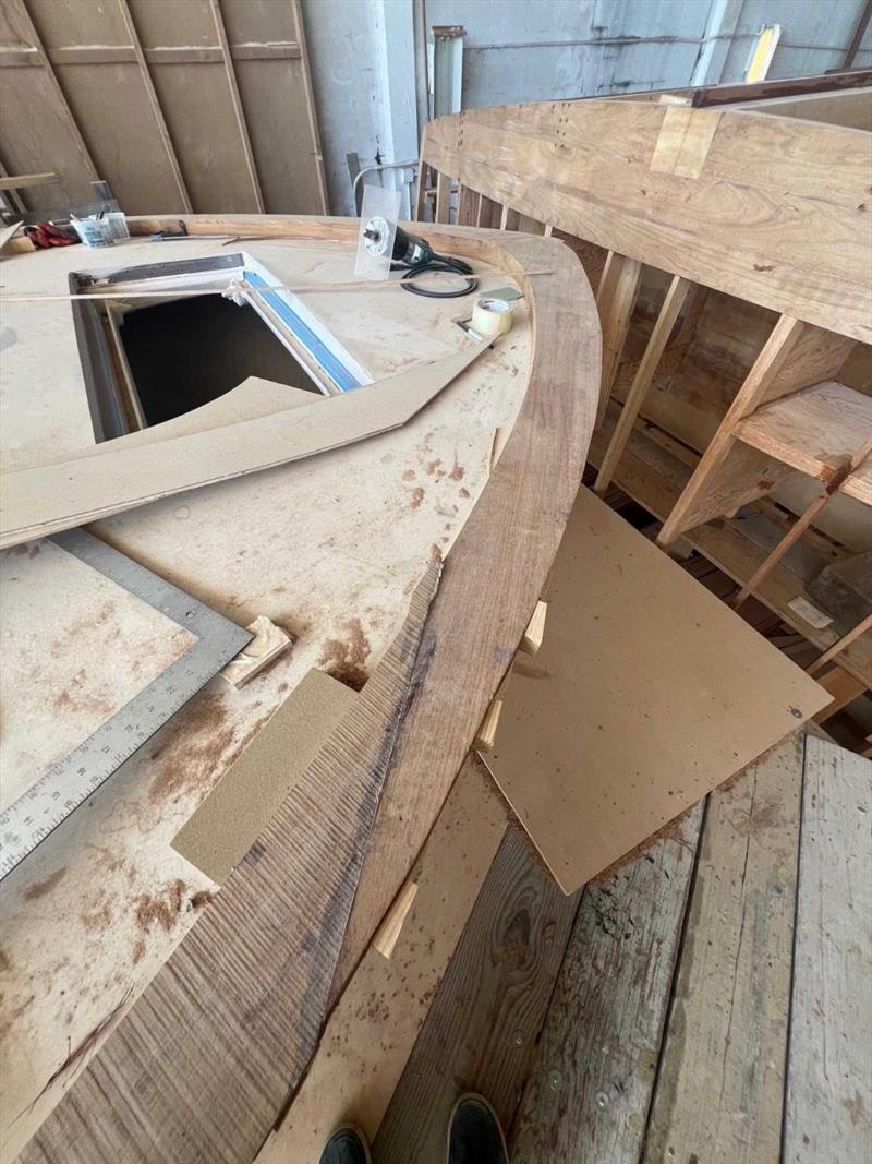 Hull #10 - Toe rail sections glued down - photo © Michael Rybovich & Sons