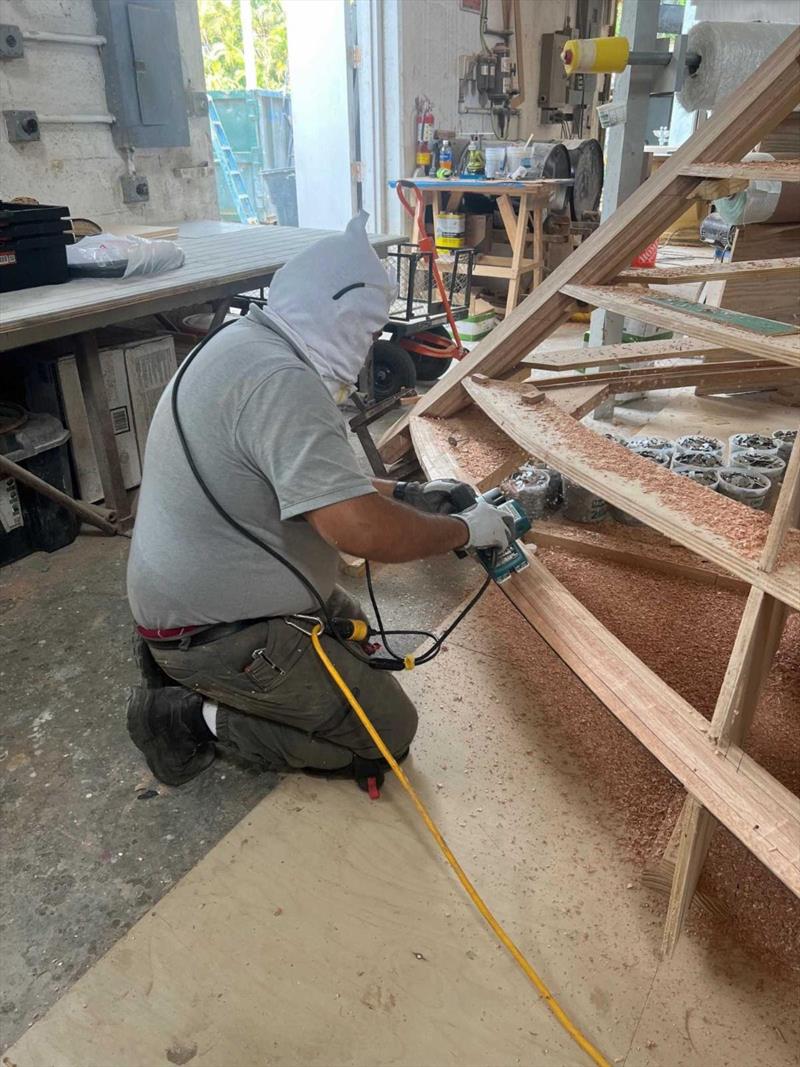 Hull #12 - Sal shaping sheer clamp - photo © Michael Rybovich & Sons