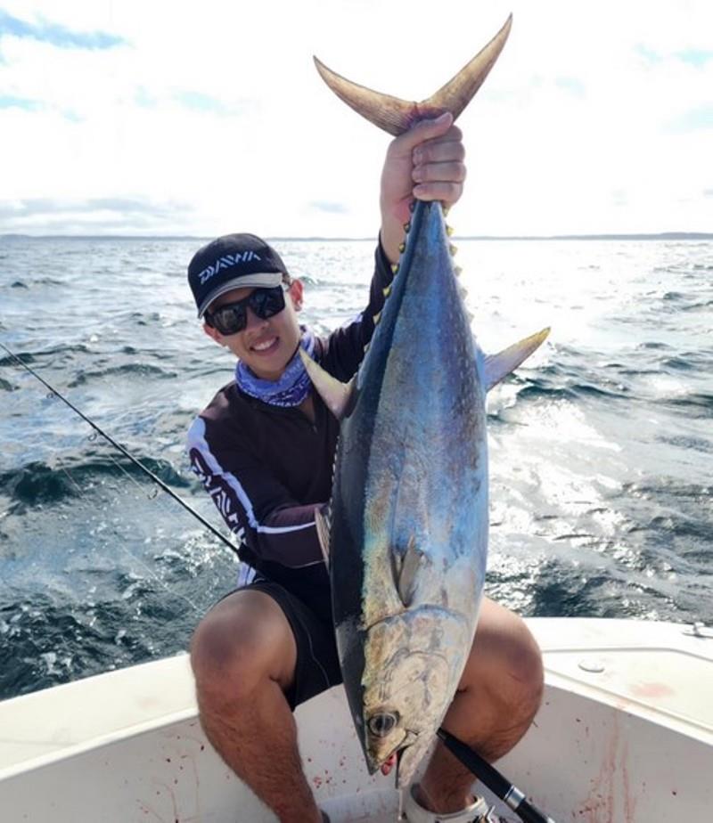 Sean was ecstatic when he hauled in this beaut longtail recently. The weather won't slow them down this week, but it might slow us down - photo © Fisho's Tackle World