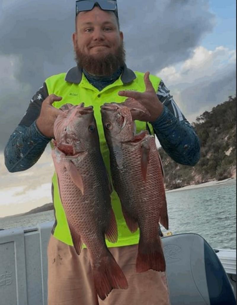 Michael with a couple of good jacks that didn't get far on their migratory move out to the reefs - photo © Fisho's Tackle World