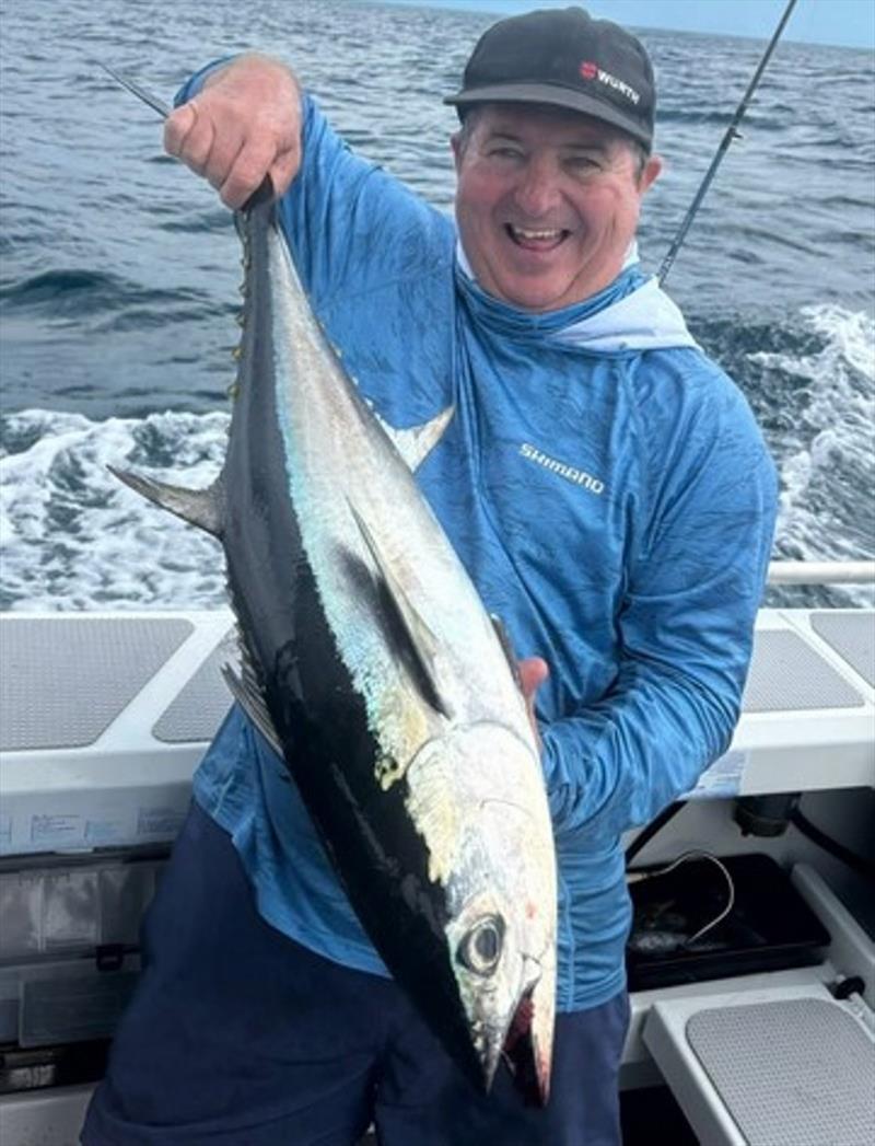 Jeff raised a smile catching longtails out on the bay - photo © Fisho's Tackle World