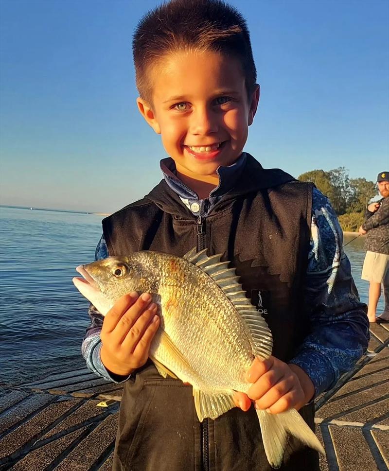 Young Kingy Ridgeway is a master bream fisho in the making. He regularly catches big bream shore-based such as this one photo copyright Fisho's Tackle World Hervey Bay taken at  and featuring the Fishing boat class