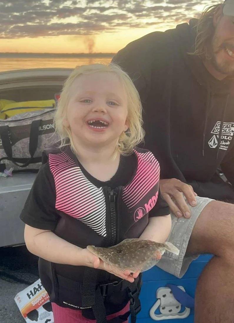 Mia Ross thought this little flounder was cute and loved fishing with her dad, Chris - photo © Fisho's Tackle World Hervey Bay