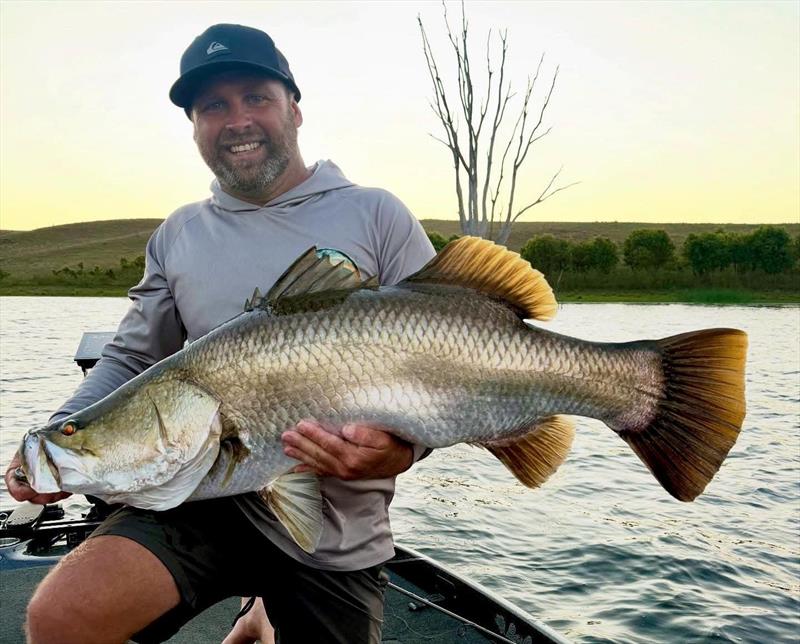 Mark with an example of the average barra Mondy fishos are catching these days photo copyright Fisho's Tackle World Hervey Bay taken at  and featuring the Fishing boat class