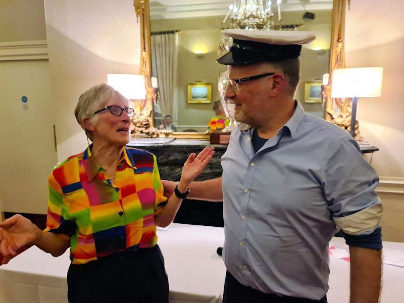 Jill Fleming hands over the 'Class Captain's Cap' to incoming Class Captain Robin Hilliard - Dun Laoghaire Flying Fifteen fleet prize-giving 2022 photo copyright DBSC taken at Dublin Bay Sailing Club and featuring the Flying Fifteen class