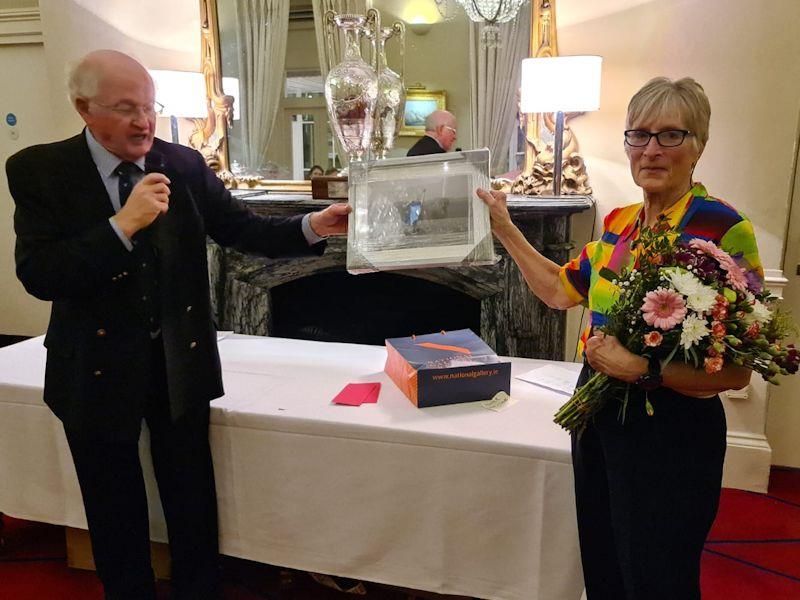 Dun Laoghaire Flying Fifteen stalwart and crew to Jill Fleming in recent seasons, Frank Burgess, makes a presentation to Jill - Dun Laoghaire Flying Fifteen fleet prize-giving 2022 photo copyright DBSC taken at Dublin Bay Sailing Club and featuring the Flying Fifteen class