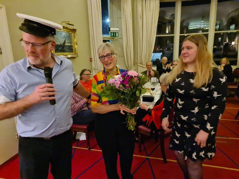 2023 Class Captain Robin Hilliard and his deputy-crew-daughter, Dascha, make a presentation to outgoing Class Captain (2022) Jill Fleming - Dun Laoghaire Flying Fifteen fleet prize-giving 2022 photo copyright DBSC taken at Dublin Bay Sailing Club and featuring the Flying Fifteen class