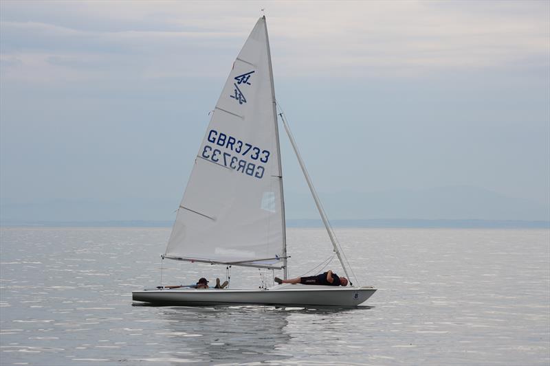 No wind so catching up on sleep! Michael and Sarah Harris from Blackpool & Fleetwood Sailing Club taking it easy at the Scottish Flying Fifteen Championship photo copyright Lindsay Tosh taken at Solway Yacht Club and featuring the Flying Fifteen class