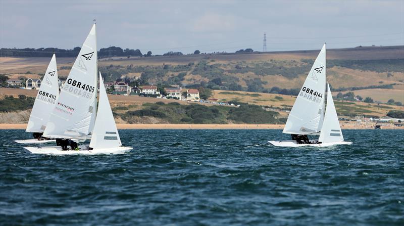 Race 9 - GBR 4144 keeping close tabs on GBR 4005 on day 5 of the 2025 Flying Fifteen Worlds at the WPNSA photo copyright Mark Jardine taken at Weymouth & Portland National Sailing Academy and featuring the Flying Fifteen class