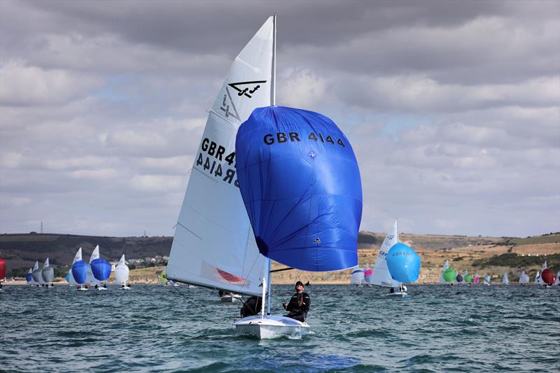 Race 9 - GBR 4144 lead on the first downwind leg on day 5 of the 2025 Flying Fifteen Worlds at the WPNSA photo copyright Mark Jardine taken at Weymouth & Portland National Sailing Academy and featuring the Flying Fifteen class