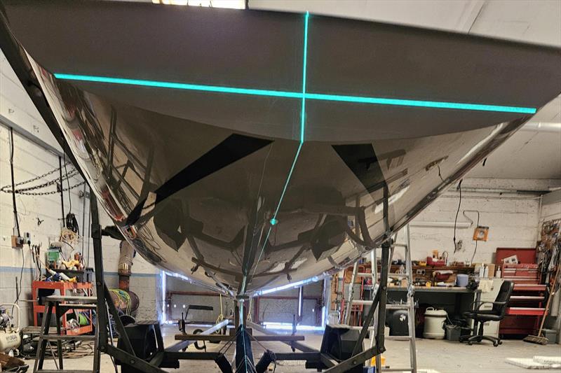 GBR4148 - Using a laser to align the keel - photo © Simon Patterson