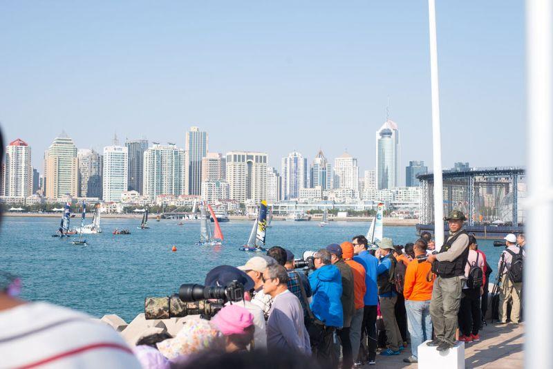 Tens of thousands of spectators watched the foiling action over the four days of racing in Fushan Bay, Qingdao - Day 4 - Extreme Sailing Series Qingdao Mazarin Cup photo copyright Patrick Condy taken at  and featuring the Flying Phantom class