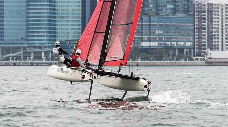 Mark Thornburrow (helm) ready for a crack at the Cariad Trophy (Hong Kong) photo copyright Guy Nowell taken at Royal Hong Kong Yacht Club and featuring the Flying Phantom class
