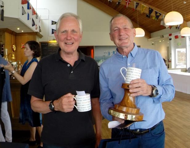 David Gredley (Lady Linda) and Nick Ingram (Otter) picking up their prizes for the Summer Regatta photo copyright Chris Baldwick taken at Royal Lymington Yacht Club and featuring the Folkboat class