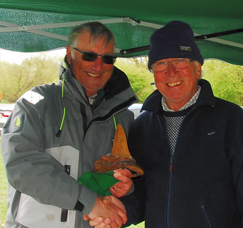 John Burgoine receiving Fred's Big Toephy from RO Martin Crysell (on the right) - Fred's Big Toephy (Footy class at Chertsey) photo copyright Peter Dunne taken at Guildford Model Yacht Club and featuring the Footy class