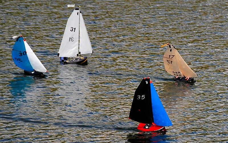 Roger Stollery's ICE 17 pushing John for the lead - Fred's Big Toephy (Footy class at Chertsey) photo copyright Peter Dunne taken at Guildford Model Yacht Club and featuring the Footy class