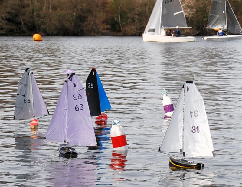 The top 3, John Burgione 35, Peter Shepherd 65, Oliver Stollery 63 rounding the windward mark during the 2022 Footy Nationals & Videlo Globe at Frensham photo copyright Roger Stollery taken at Frensham Pond Sailing Club and featuring the Footy class