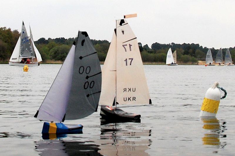 Charles Smith 00 in Ukrainian colours, leading Vlad UKR 17 on the final leg - Footy class Videlo Globe at Frensham Pond photo copyright Roger Stollery taken at Frensham Pond Sailing Club and featuring the Footy class