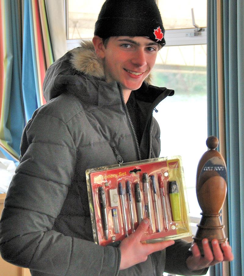 Oliver Stollery with his prize and Junior Champion's Trophy - Footy National Championship at Frensham photo copyright Peter Stollery taken at Frensham Pond Sailing Club and featuring the Footy class