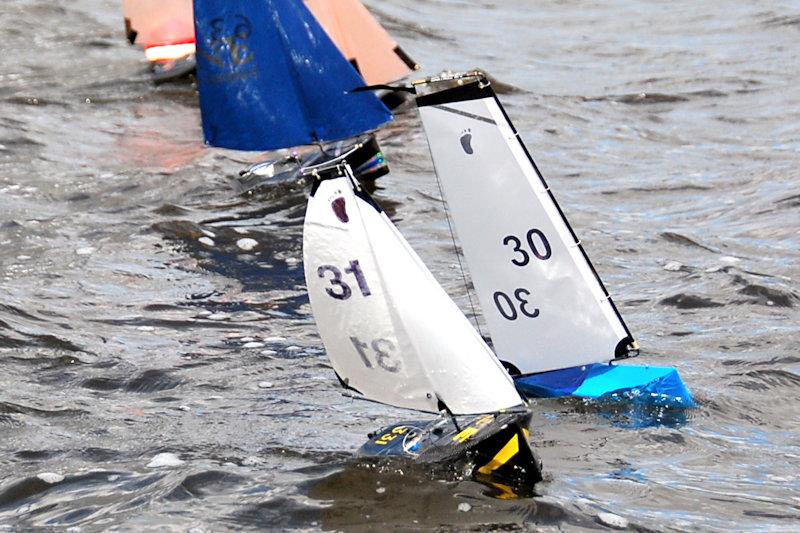 Peter Jackson (30) sailing his balanced una rigged F Plan gets away to the best start - Footy National Championship at Frensham photo copyright Roger Stollery taken at Frensham Pond Sailing Club and featuring the Footy class