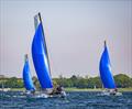 Nick Barnes' F18 races Will Smith and the Nacra 15 for the finish during the Rutland Cat Open 2024 © Gordon Upton / www.guppypix.com