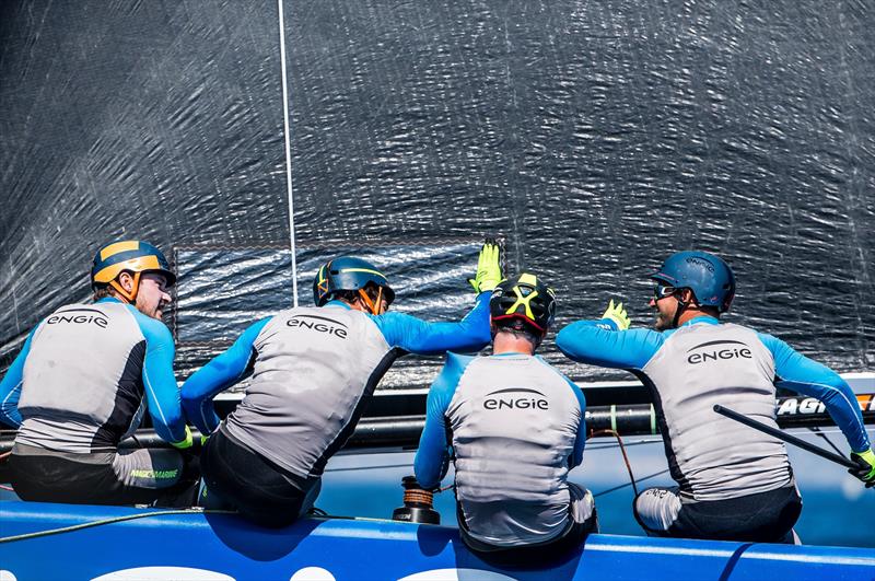 High fives after Team ENGIE wins race 8 on day 2 of the GC32 La Reserva de Sotogrande Cup - photo © Jesus Renedo / GC32 Racing Tour