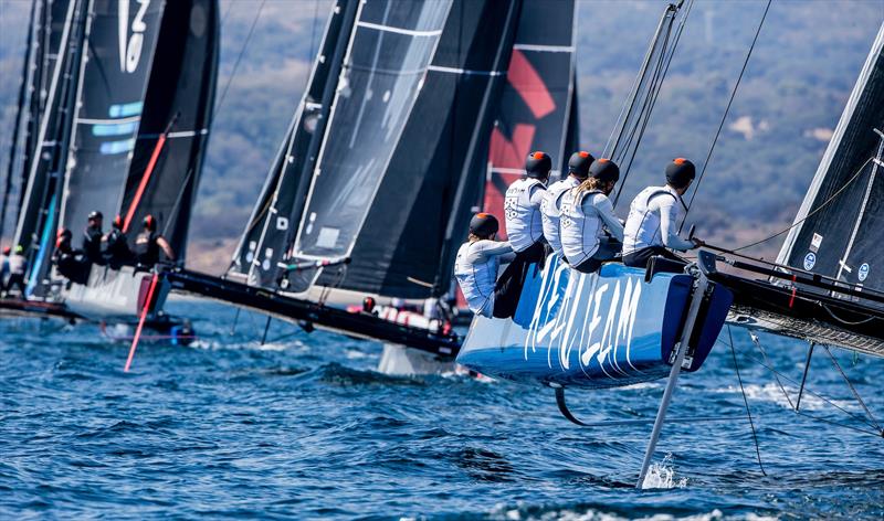 RealTeam chase the fleet in light winds on day 2 of the GC32 La Reserva de Sotogrande Cup - photo © Jesus Renedo / GC32 Racing Tour