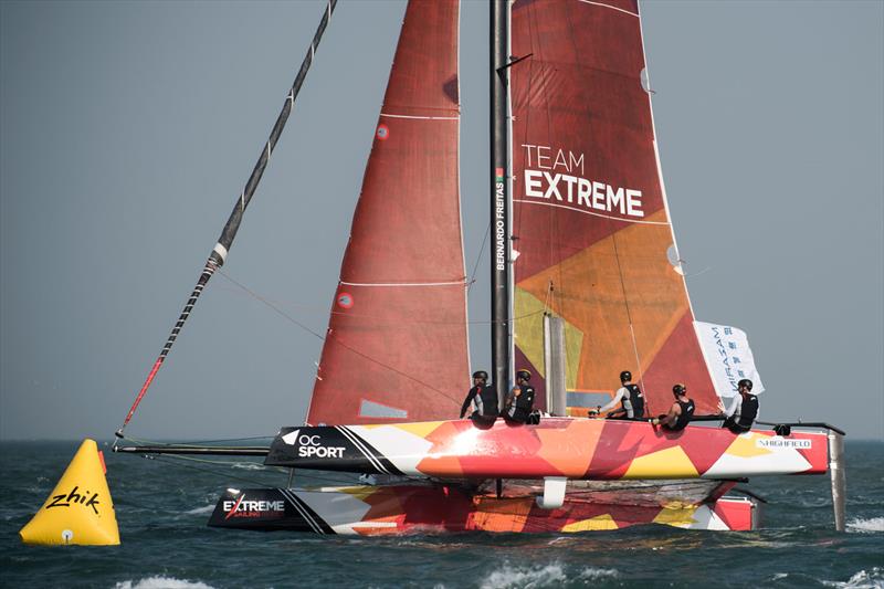 Tom Buggy on his foiling wakeboard behind a foiling GC32 catamaran photo copyright Xaume Oleos / OC Sport taken at  and featuring the GC32 class