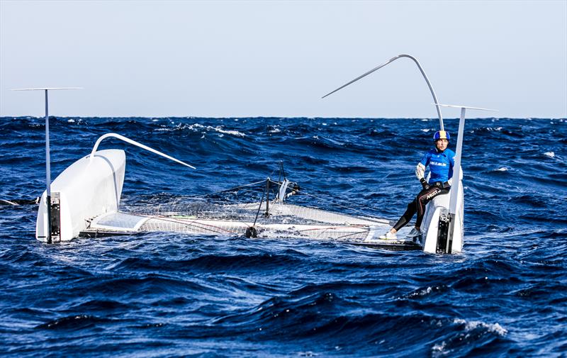 Erik Maris' Zoulou capsized in the big waves prior to racing on day 1 of the GC32 Racing Tour Orezza Corsica Cup - photo © Jesus Renedo / GC32 Racing Tour