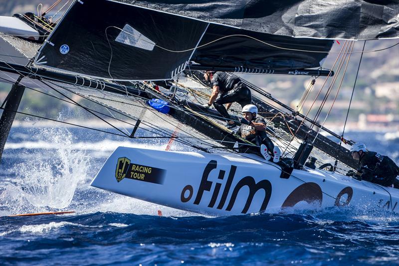 Simon Delzoppo's .film Racing split seconds before nearly going critical on day 2 of the GC32 Racing Tour Orezza Corsica Cup photo copyright Jesus Renedo / GC32 Racing Tour taken at  and featuring the GC32 class