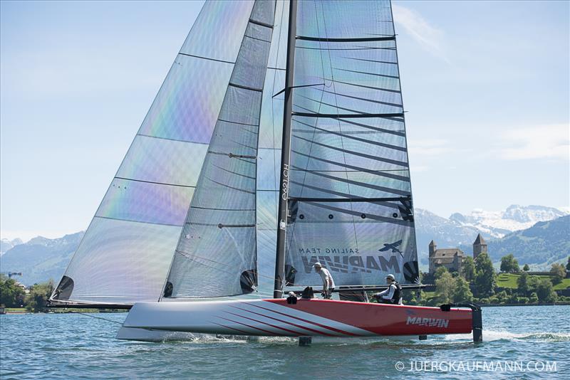 MARWIN Sailing Team takes line honours in the Zurich to Rapperswil race after being christened by former Miss Switzerland Jenny Ann Gerber photo copyright Juerg Kaufmann / www.juergkjaufmann;.com taken at Zürcher Segel Club and featuring the GC32 class