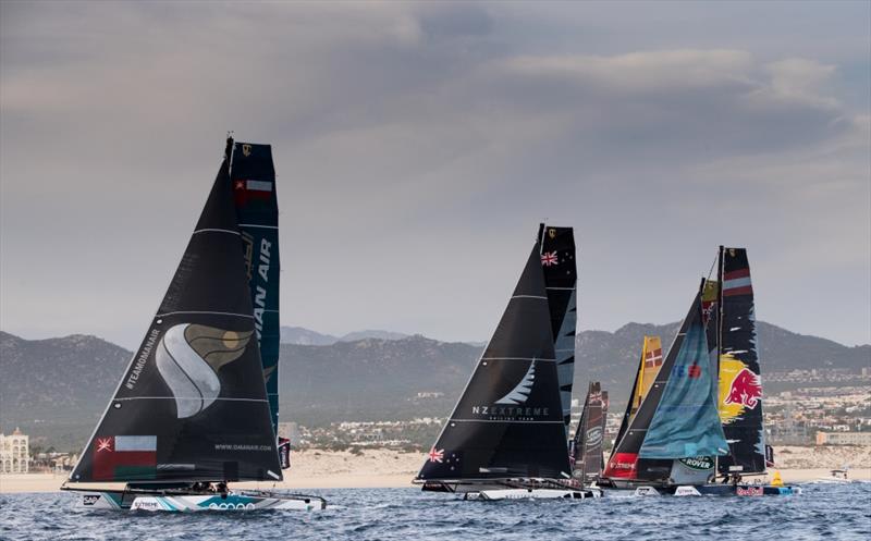 The Extreme Sailing Series 2017. Act 8. 30th November- 3rd December 2017. Los Cabos Mexico, Cabo San Lucas Resort. Pictures of the fleet of race yachts crossing the start line on day 2 of racing close to Los Cabos photo copyright Lloyd Images taken at  and featuring the GC32 class