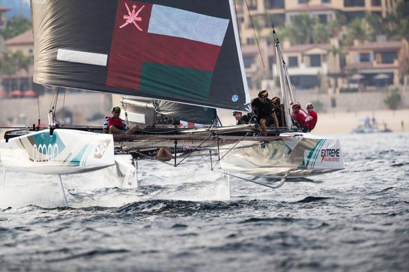 The Oman Air' race team shown in action close to the shore, skippered by Phill Robertson (NZL) with team mates Pete Greenhalgh (GBR), Ed Smyth (NZL/AUS), James Wierzbowski (AUS) and Nasser Al Mashari (OMA) during the Extreme Sailing Series on December 2 photo copyright Lloyd Images taken at  and featuring the GC32 class
