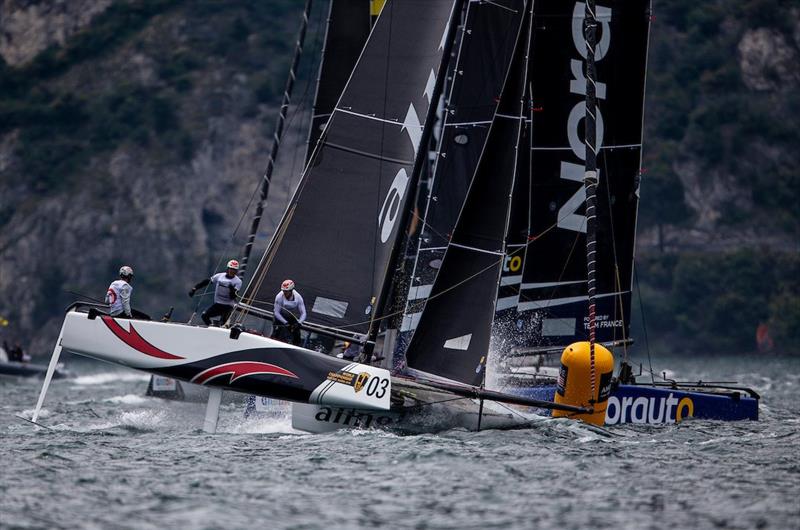 Alinghi ahead of the Cammas skippered Norauto - 2018 GC32 World Championship, Lake Garda, Italy photo copyright Pedro Martinez / GC32 World Championship taken at  and featuring the GC32 class