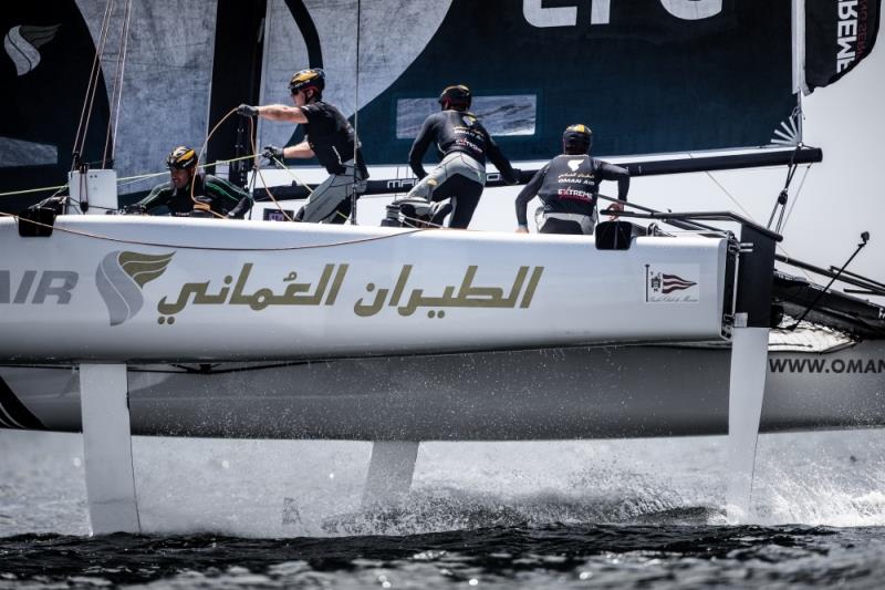 The 'Oman Air' race team shown in action close to the shore, skippered by Phill Robertson (NZL) with team mates Pete Greenhalgh (GBR), Stewart Dodson (NZL), James Wierzbowski (AUS) and Nasser Al Mashari (OMAN) photo copyright Sander van der Borch taken at  and featuring the GC32 class