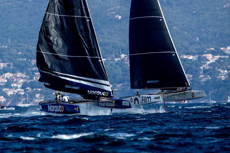 NORAUTO fends off an advancing .film Racing on day 3 of the GC32 TPM Med Cup photo copyright Sailing Energy / GC32 Racing Tour taken at  and featuring the GC32 class