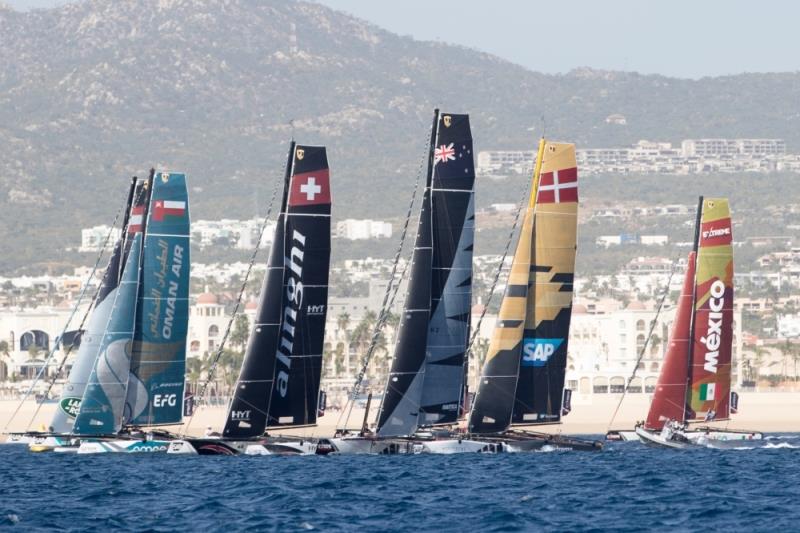 The fleet of race yachts crossing the start line on Day 1 of racing close to Los Cabos - Extreme Sailing Series 2017, Act 8 - 30th November- 3rd December 2017. Los Cabos, Mexico, Cabo San Lucas Resort photo copyright Lloyd Images taken at  and featuring the GC32 class