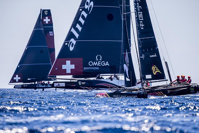 The heat of battle today - Black Star Sailing Team, Alinghi and ChinaONE Ningbo - 2019 GC32 Racing Tour - Villasimius Cup photo copyright Jesus Renedo / Sailing Energ taken at  and featuring the GC32 class