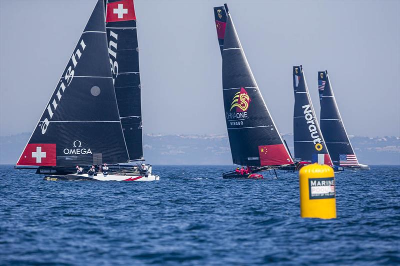 Alinghi does the 'wild thing' downwind in a light patch today. - photo © Jesus Renedo / Sailing Energy / GC32 Racing Tour