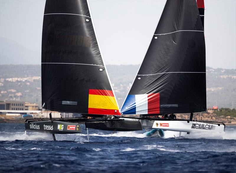 The Iker Martinez-steered M&G Tressis Silicius crosses ahead of Erik Maris' Zoulou. - 38 Copa del Rey MAPFRE - photo © Sailing Energy / GC32 Racing Tour